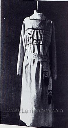 A dress decorated with braid